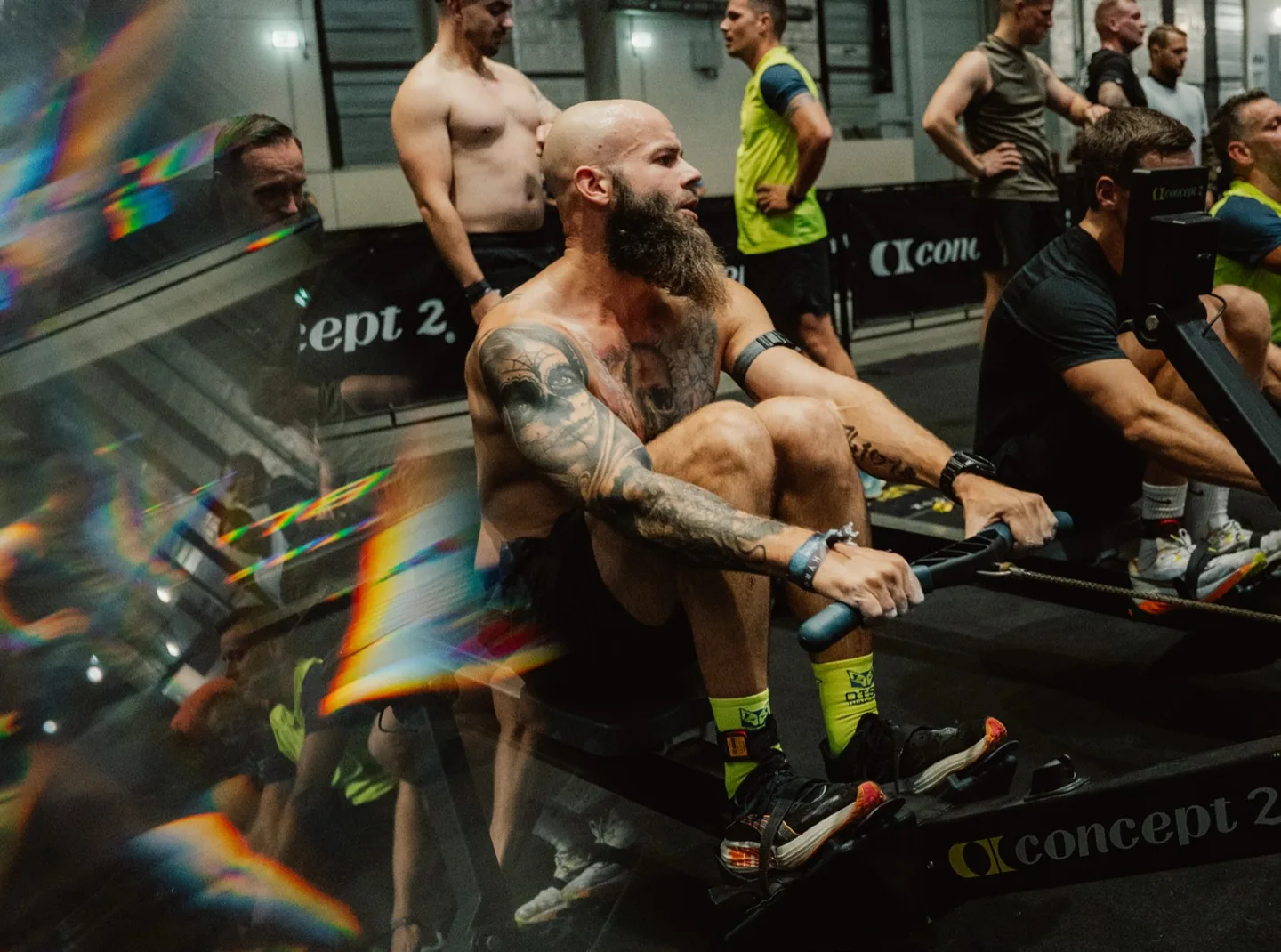 HYROX athletes on the rowing station
