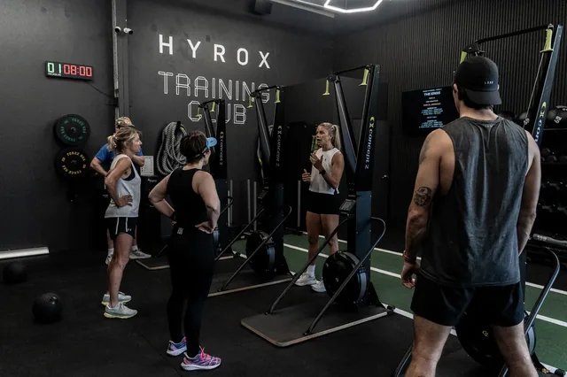 Lovisa coaching a group on the gym floor