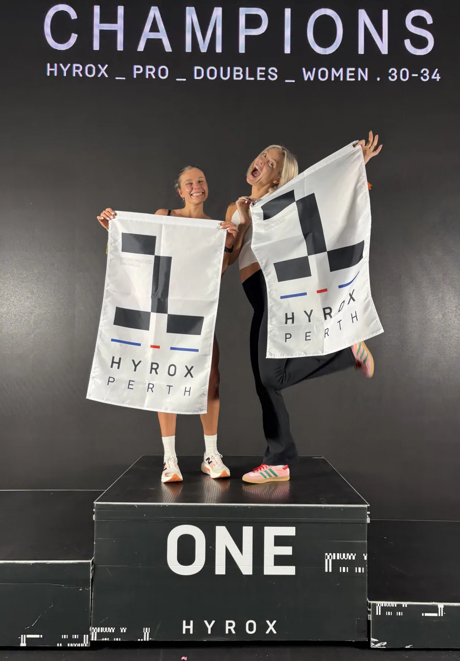 Lovisa and her doubles partner celebrating at HYROX Perth